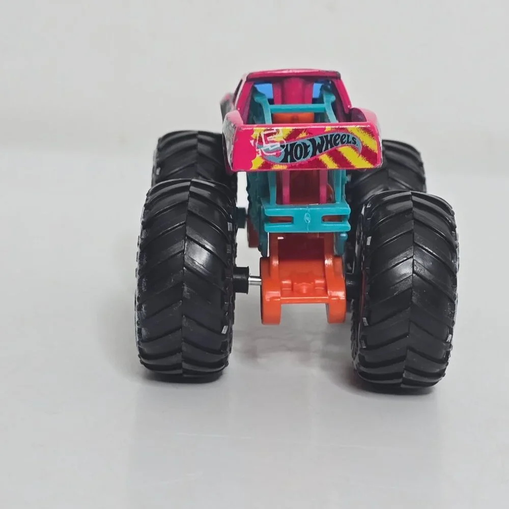2019 Hot Wheels Monster Trucks Podium Crasher HW Demo Derby Pink Graffiti 1:64